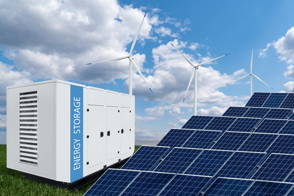 Solar panels, wind turbines, and an energy storage unit in a renewable energy setup.